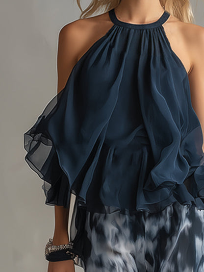 Lilla – conjunto elegante em chiffon com um top de gola alta e calças largas com padrões